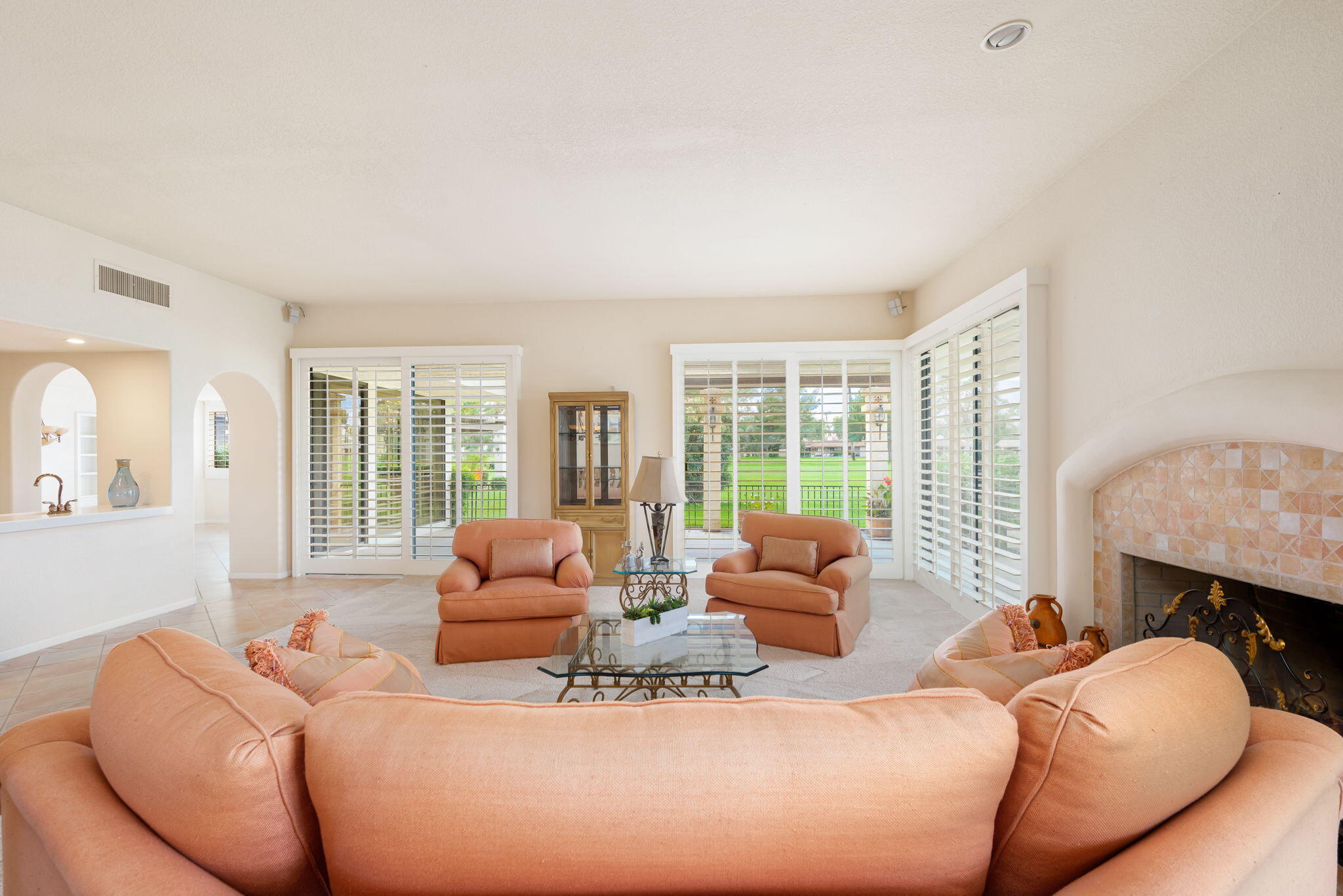 7 Tulane Court Rancho Mirage, CA 92270 - Photo 20 of 66 a living room with furniture and a fireplace