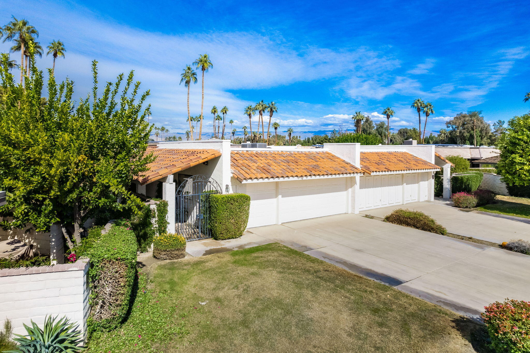 7 Tulane Court Rancho Mirage, CA 92270 - Photo 2 of 66 a view of a swimming pool with a patio