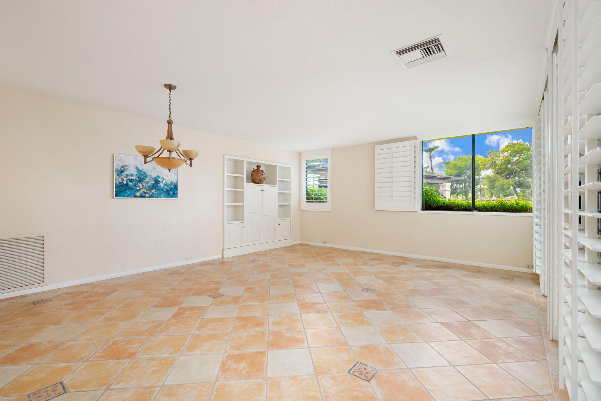 7 Tulane Court Rancho Mirage, CA 92270 - Photo 22 of 66 a view of a room with a window and a ceiling fan
