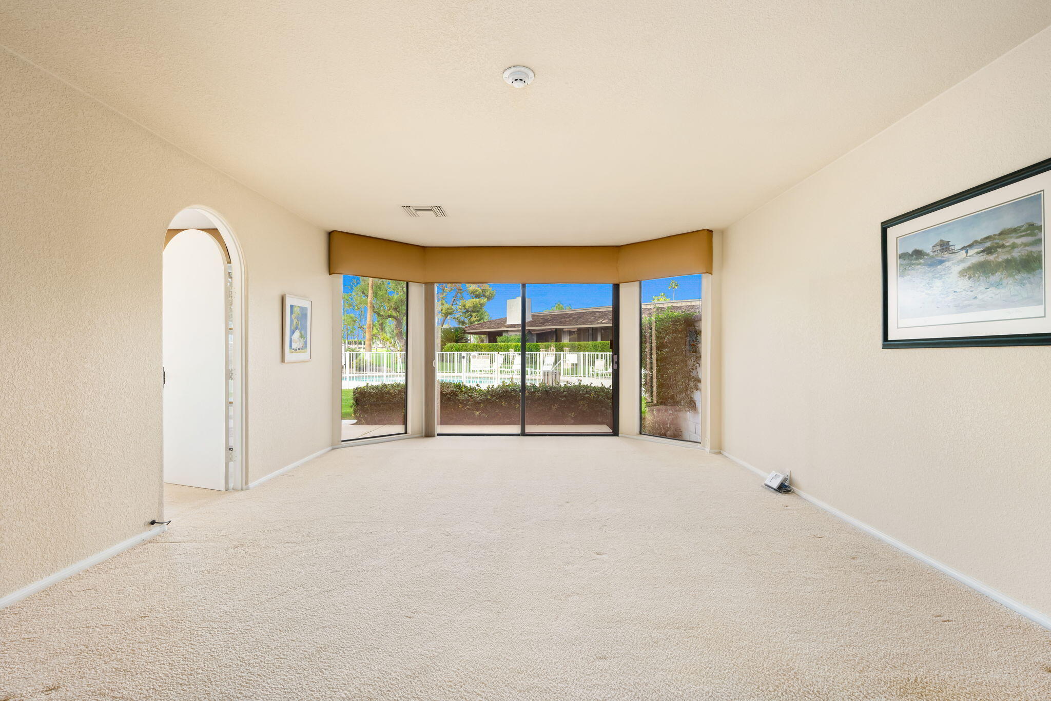 7 Tulane Court Rancho Mirage, CA 92270 - Photo 35 of 66 a view of an empty room with a sliding door