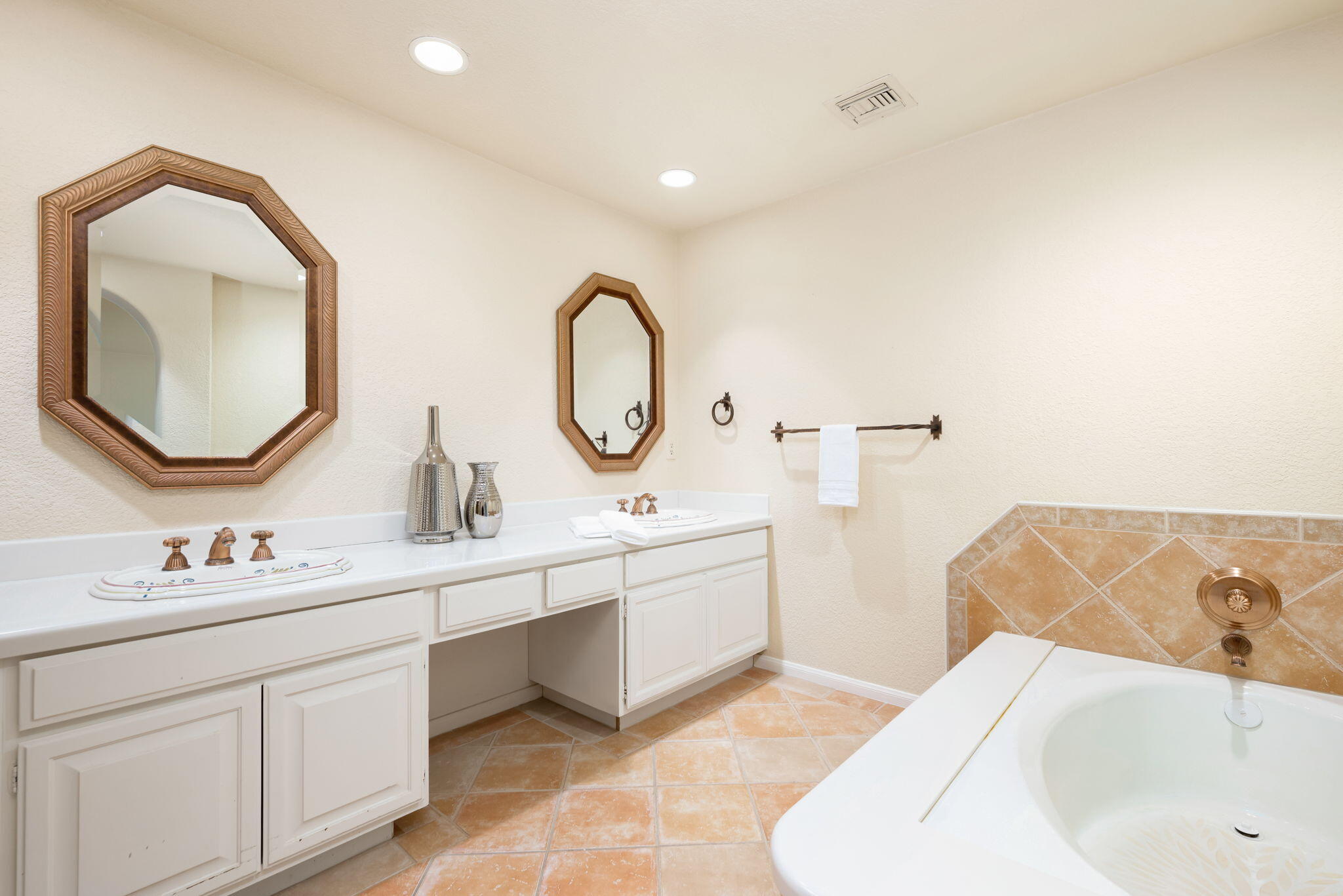 7 Tulane Court Rancho Mirage, CA 92270 - Photo 36 of 66 a en suite bathroom with a double vanity sink and a mirror