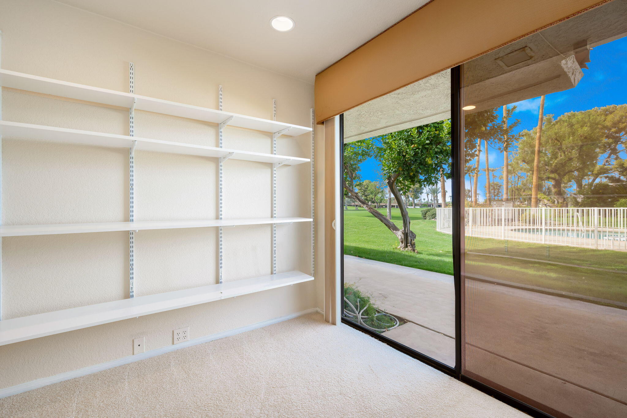 7 Tulane Court Rancho Mirage, CA 92270 - Photo 39 of 66 a view of a porch with a floor to ceiling window