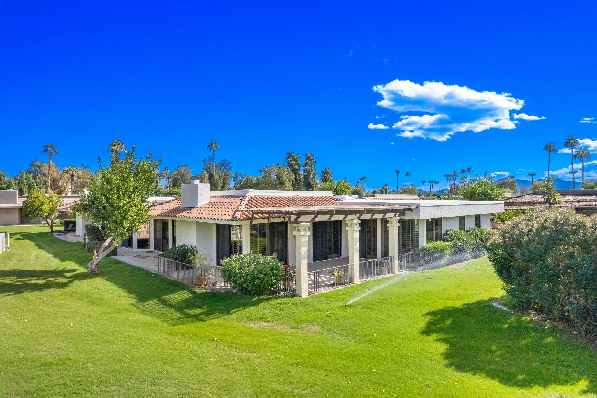7 Tulane Court Rancho Mirage, CA 92270 - Photo 4 of 66 a view of a house with a swimming pool