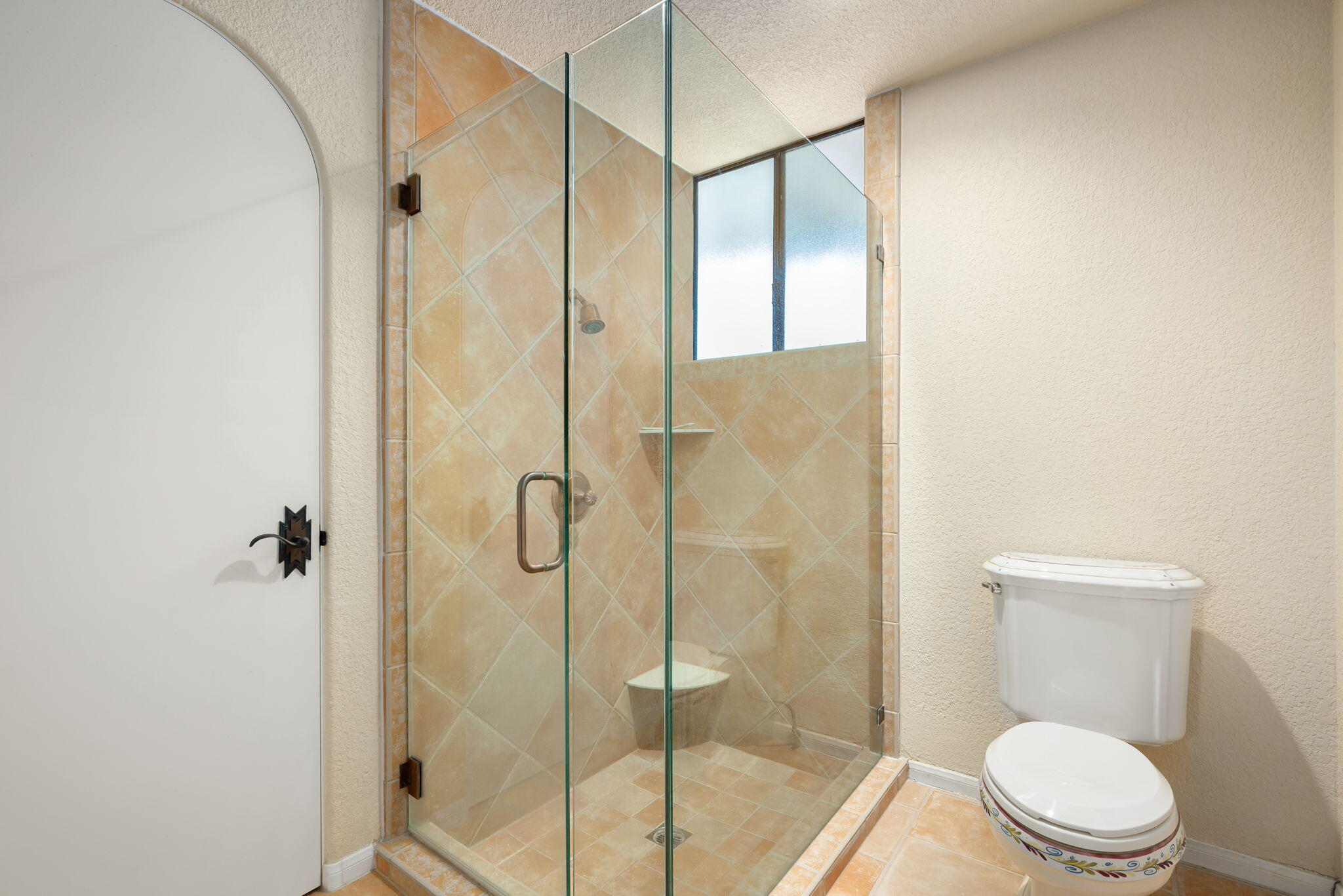 7 Tulane Court Rancho Mirage, CA 92270 - Photo 43 of 66 a bathroom with a toilet and a shower
