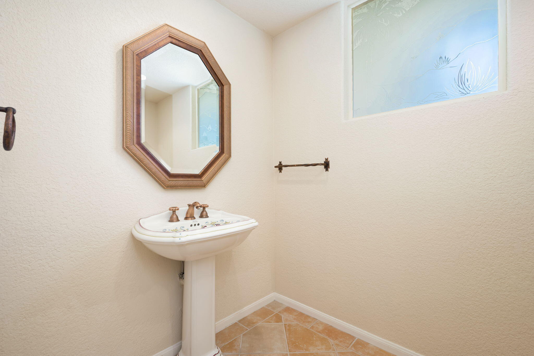 7 Tulane Court Rancho Mirage, CA 92270 - Photo 47 of 66 a bathroom with a sink and a mirror