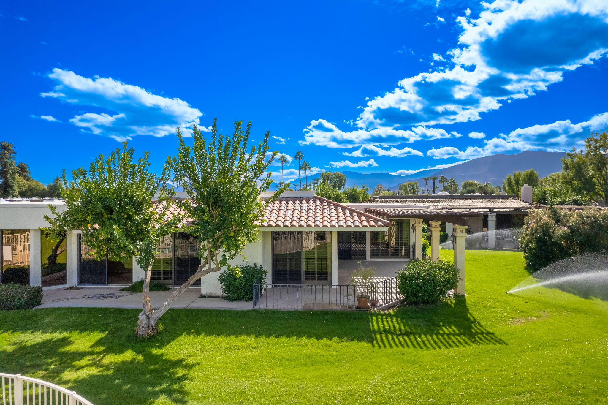 7 Tulane Court Rancho Mirage, CA 92270 - Photo 5 of 66 a front view of a house with a yard