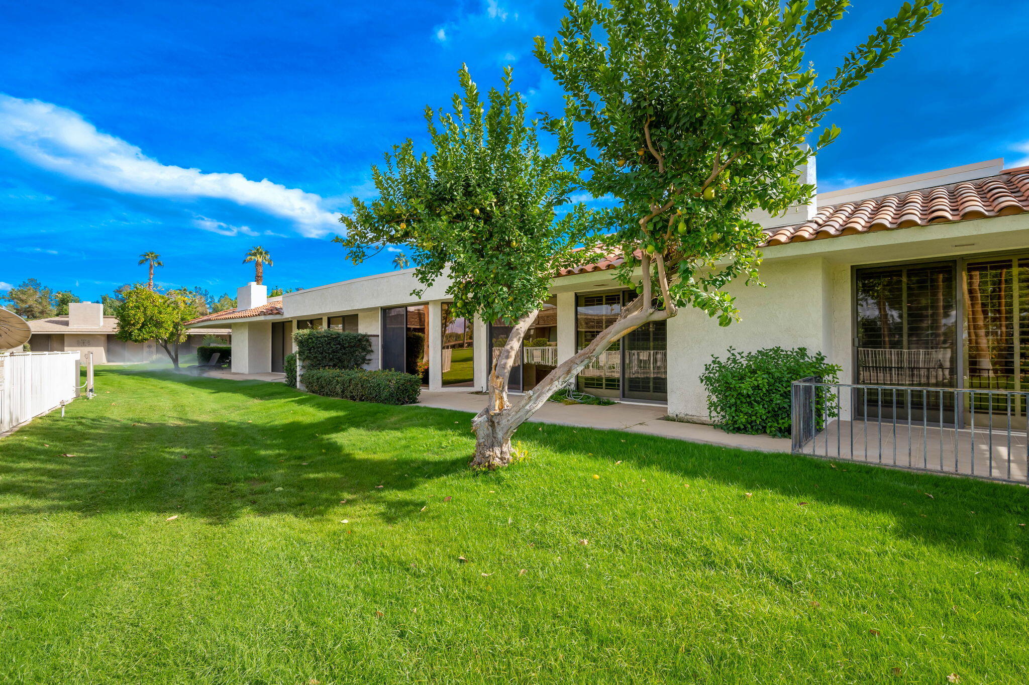 7 Tulane Court Rancho Mirage, CA 92270 - Photo 51 of 66 a front view of a house with garden