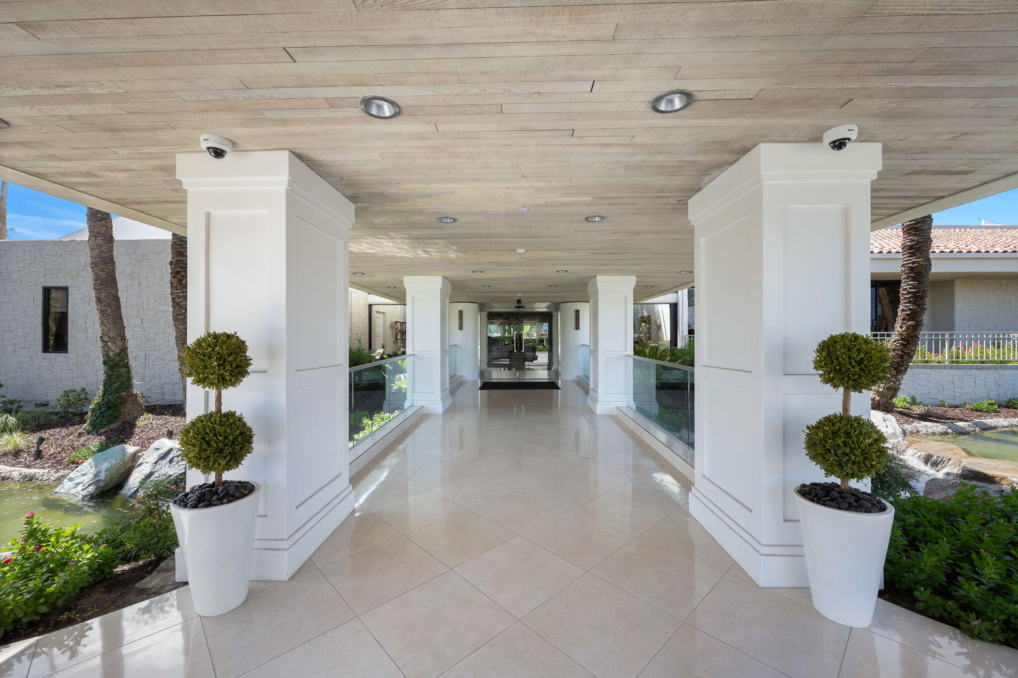 7 Tulane Court Rancho Mirage, CA 92270 - Photo 63 of 66 a lobby with furniture and potted plant
