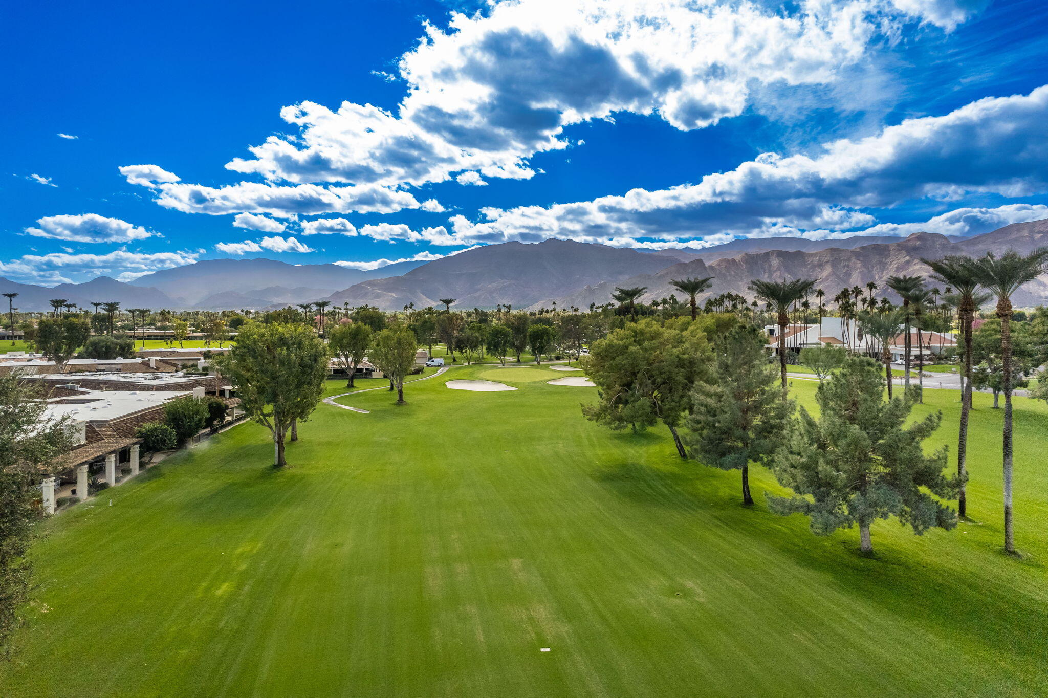 7 Tulane Court Rancho Mirage, CA 92270 - Photo 8 of 66 a view of a lake with houses