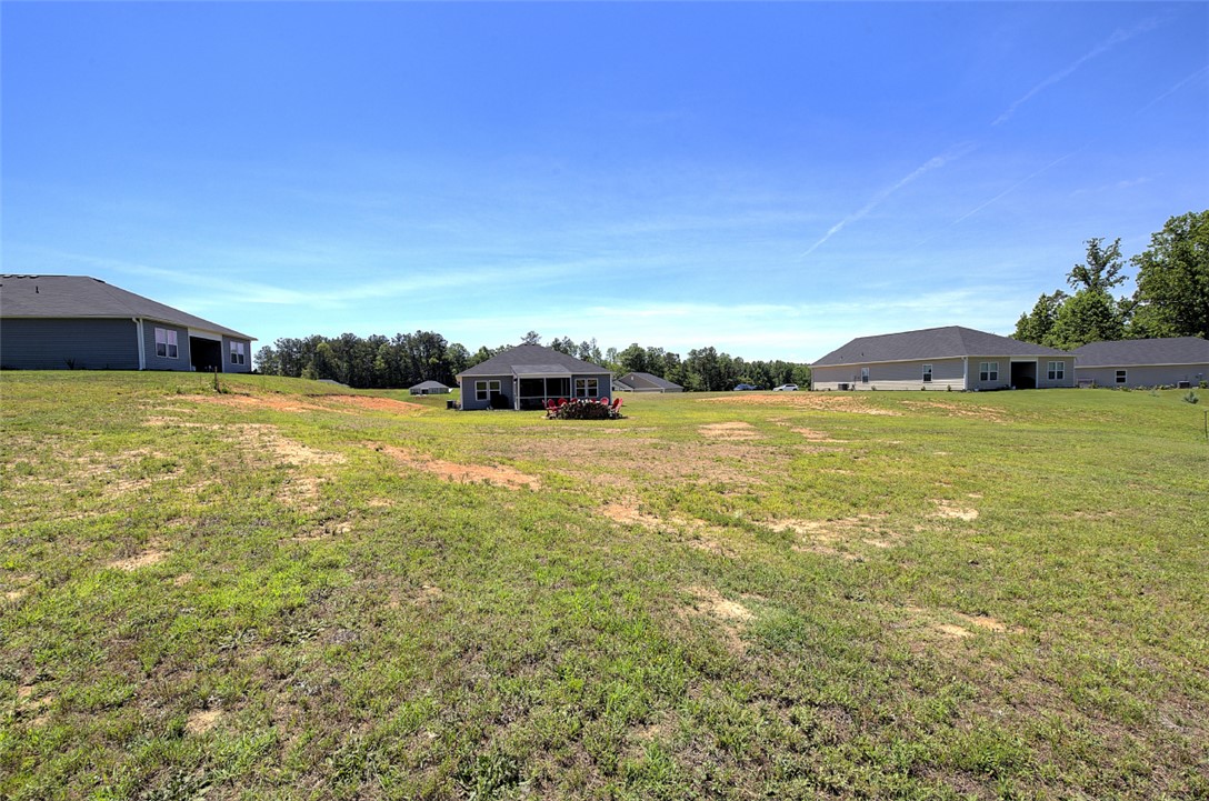 408 Chadwick Lane Walhalla, SC 29691 - Photo 35 of 44 A spacious yard offering ample outdoor living opportunities for a comfortable lifestyle.