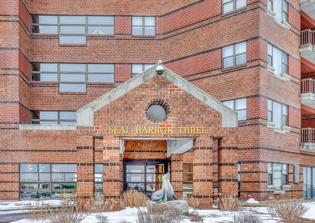 a large building with a clock on the wall