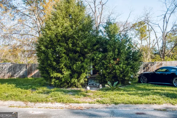 a view of swimming pool with a yard