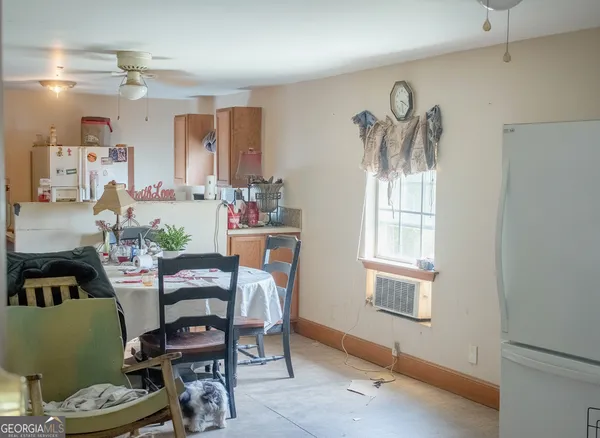 a workspace with furniture and window