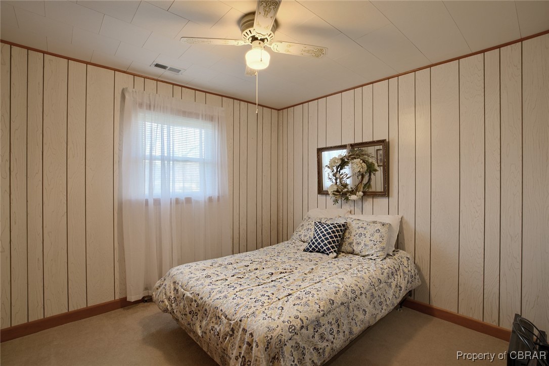 954 Carlton Road Wake, VA 23176 - Photo 14 of 25 Bedroom featuring ceiling fan and light carpet