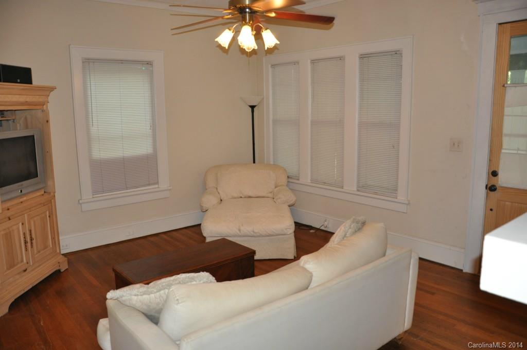 5423 Park Road Charlotte, NC 28209 - Photo 7 of 13 a living room with furniture and a window