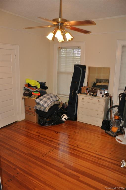 5423 Park Road Charlotte, NC 28209 - Photo 9 of 13 a room with furniture and wooden floor