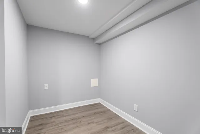 a bathroom with a sink a toilet and bathtub