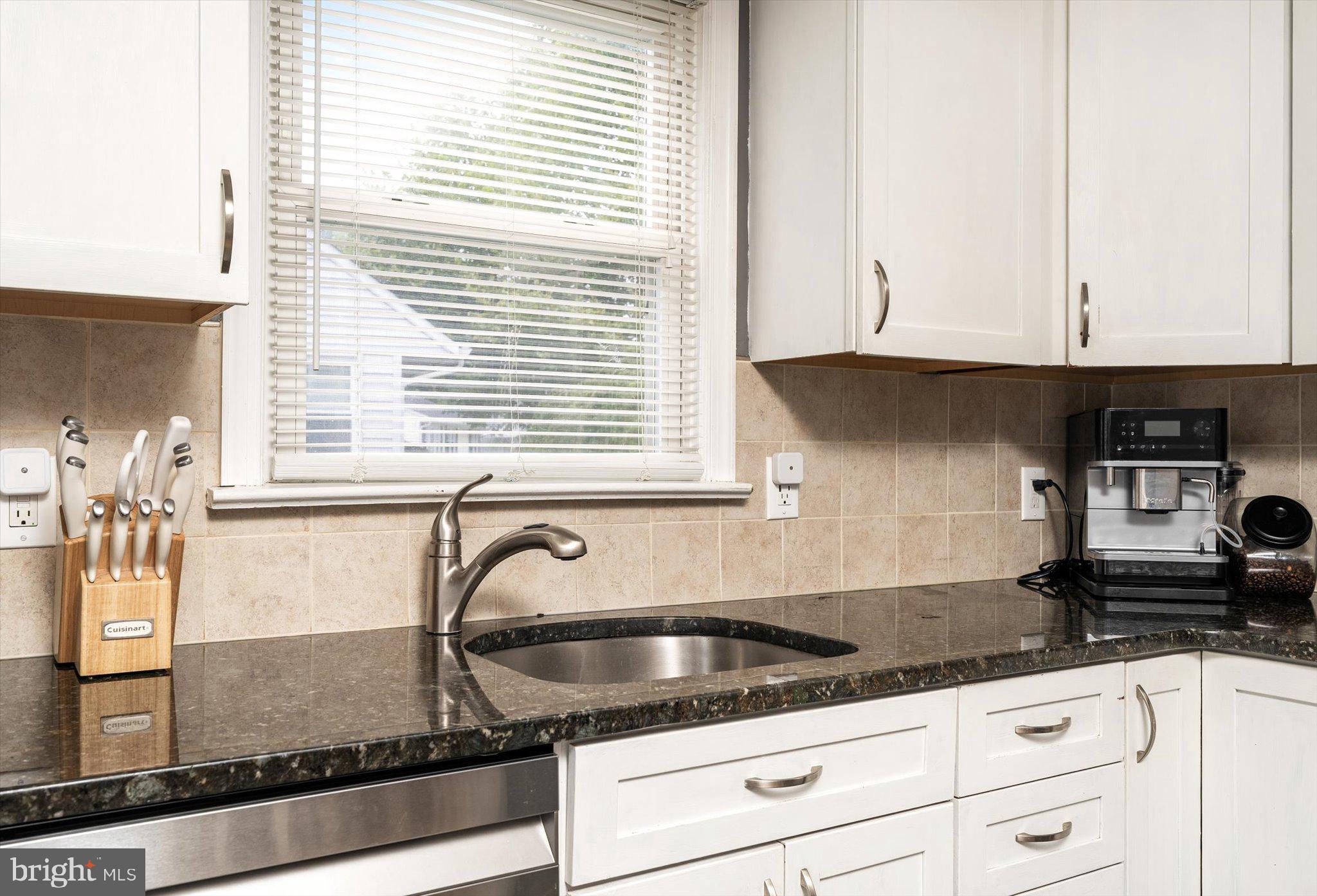 25 Holt Circle Hamilton, NJ 08619 - Photo 11 of 29 a kitchen with granite countertop white cabinets and white appliances
