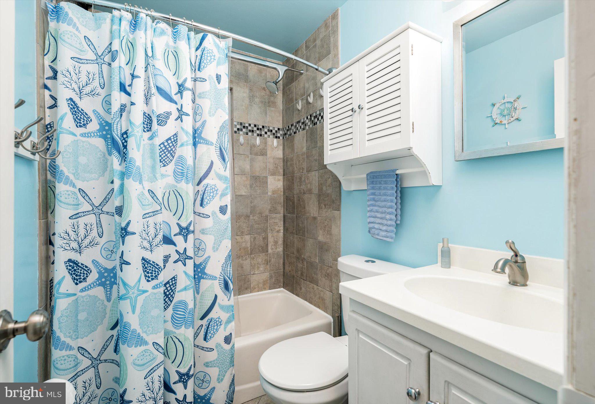 25 Holt Circle Hamilton, NJ 08619 - Photo 13 of 29 a bathroom with a sink toilet and shower