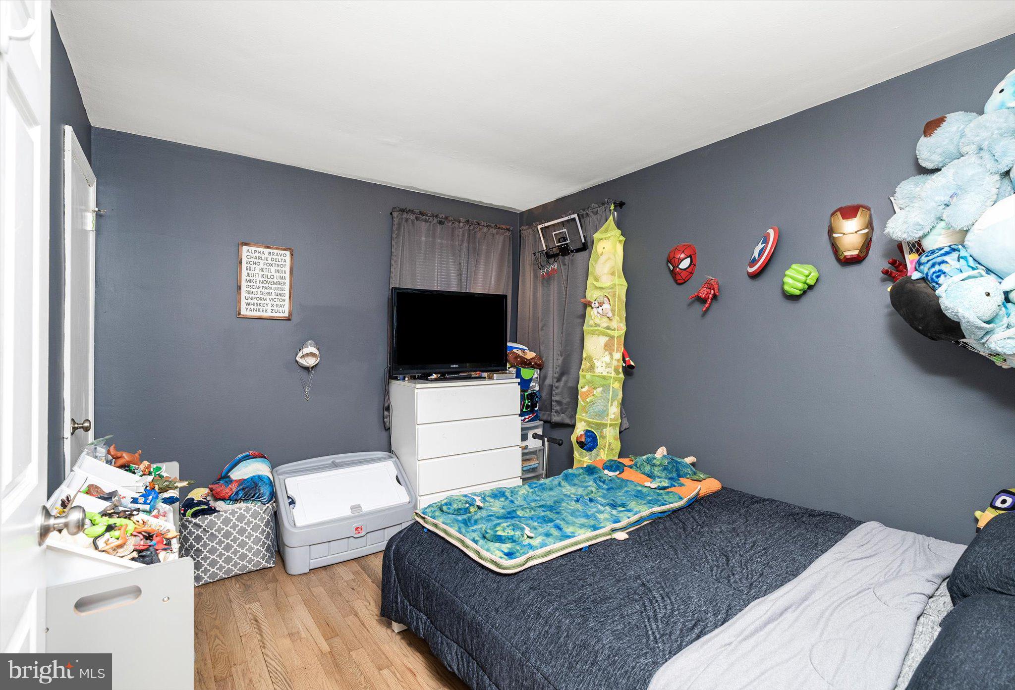 25 Holt Circle Hamilton, NJ 08619 - Photo 14 of 29 a bedroom with a bed and a couch