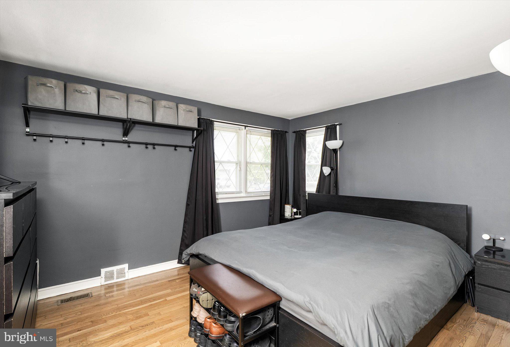 25 Holt Circle Hamilton, NJ 08619 - Photo 16 of 29 a bedroom with a bed and wooden floor