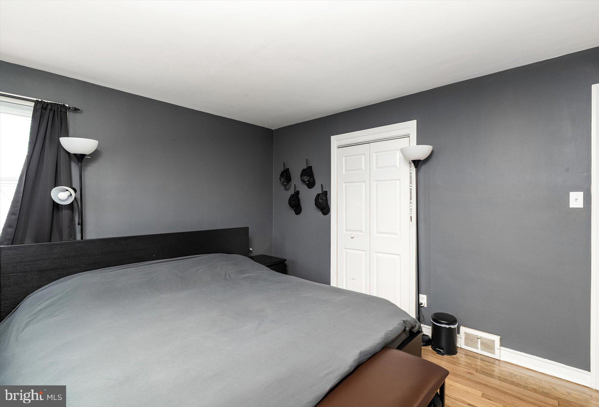 25 Holt Circle Hamilton, NJ 08619 - Photo 17 of 29 a bedroom with a bed and a lamp on the table