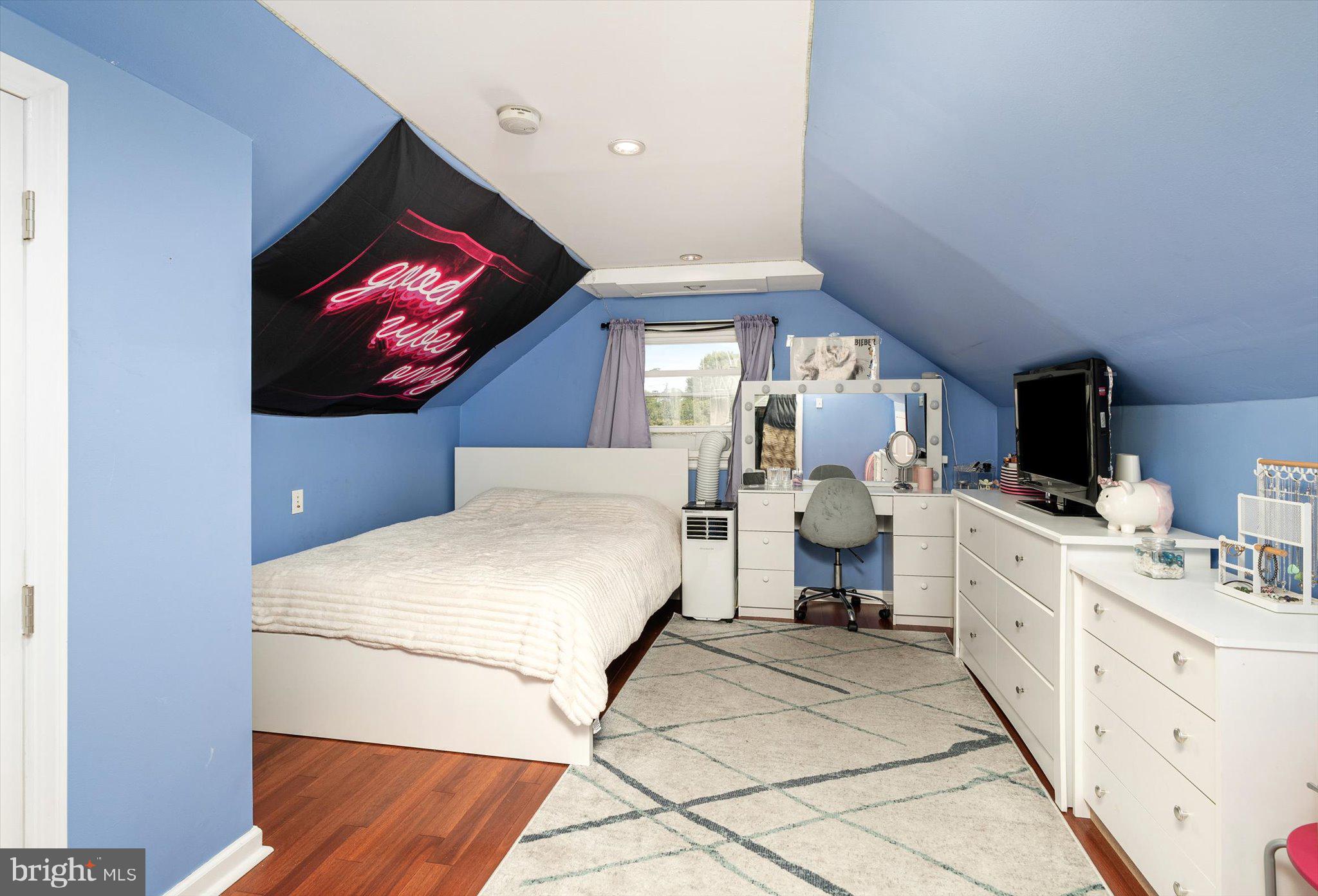 25 Holt Circle Hamilton, NJ 08619 - Photo 22 of 29 a living room with furniture and a flat screen tv