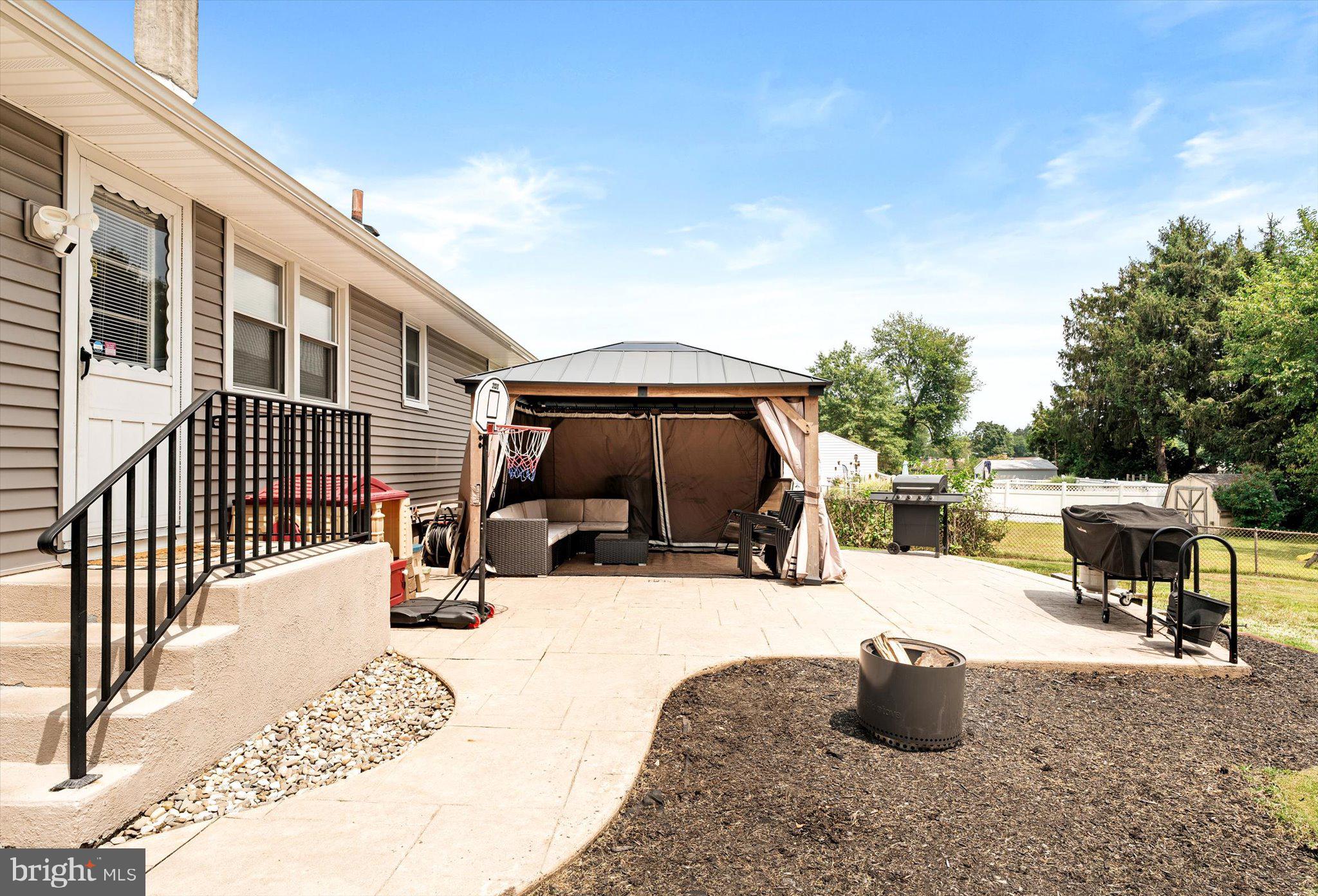 25 Holt Circle Hamilton, NJ 08619 - Photo 25 of 29 a swimming pool with outdoor seating and yard
