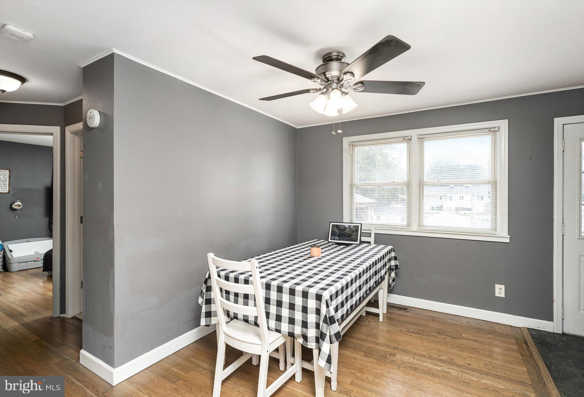 25 Holt Circle Hamilton, NJ 08619 - Photo 7 of 29 a bedroom with a bed and a chandelier