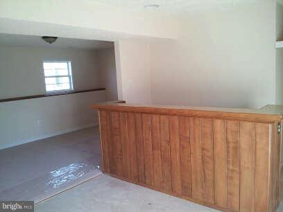 834 Oak Lee Drive Ranson, WV 25438 - Photo 6 of 6 a view of wooden floor and windows in a room