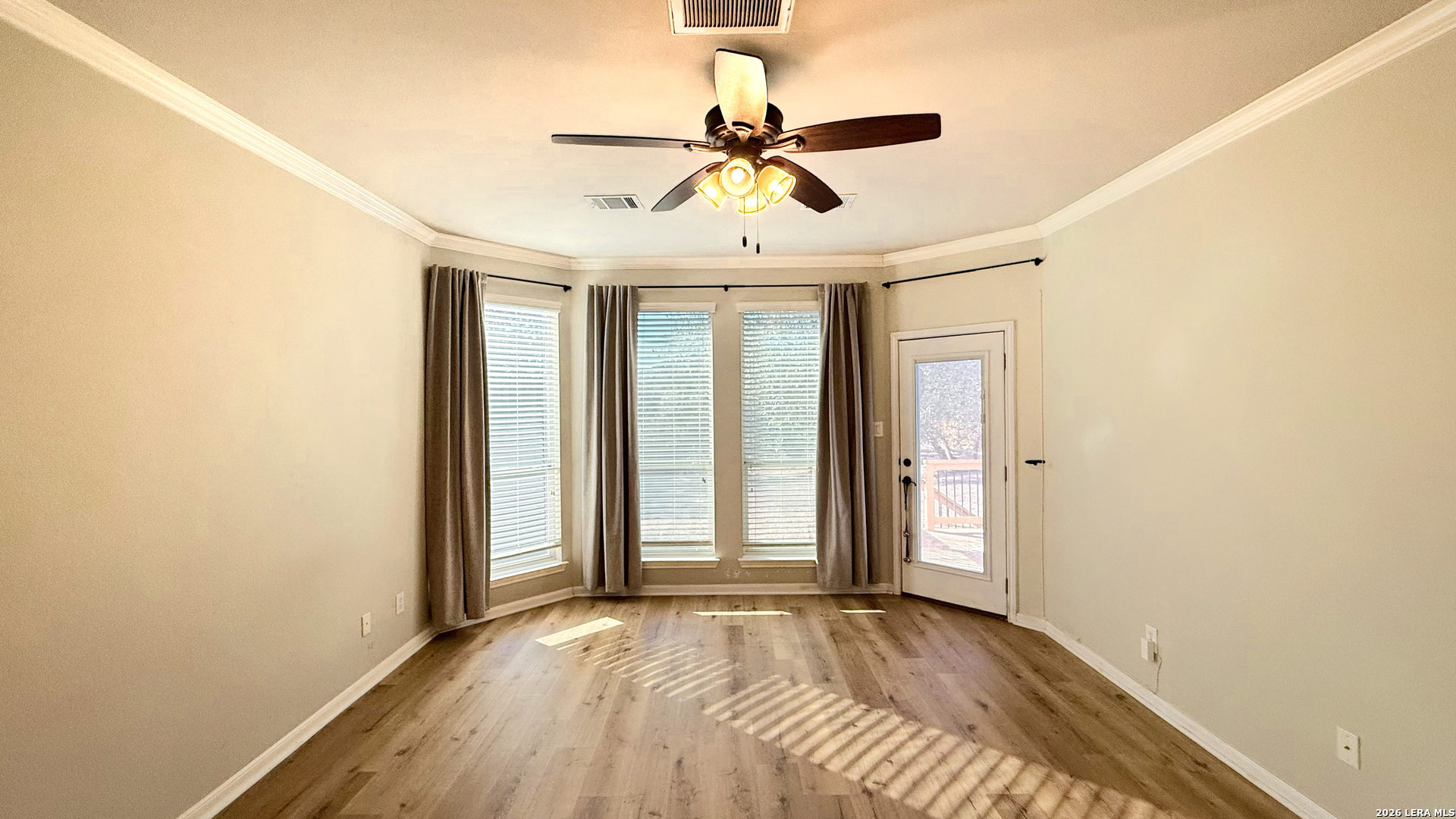 16015 Ponderosa Pth Helotes, TX 78023 - Photo 21 of 49 a view of empty room with wooden floor