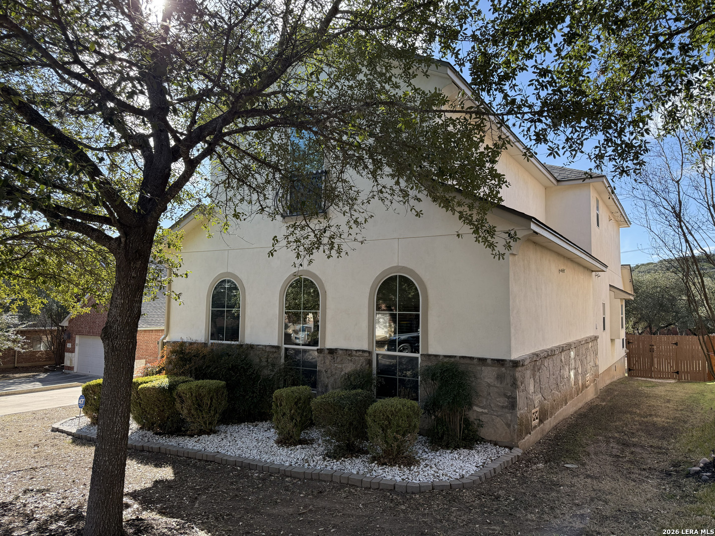 16015 Ponderosa Pth Helotes, TX 78023 - Photo 4 of 49 a view of a yard with large tree
