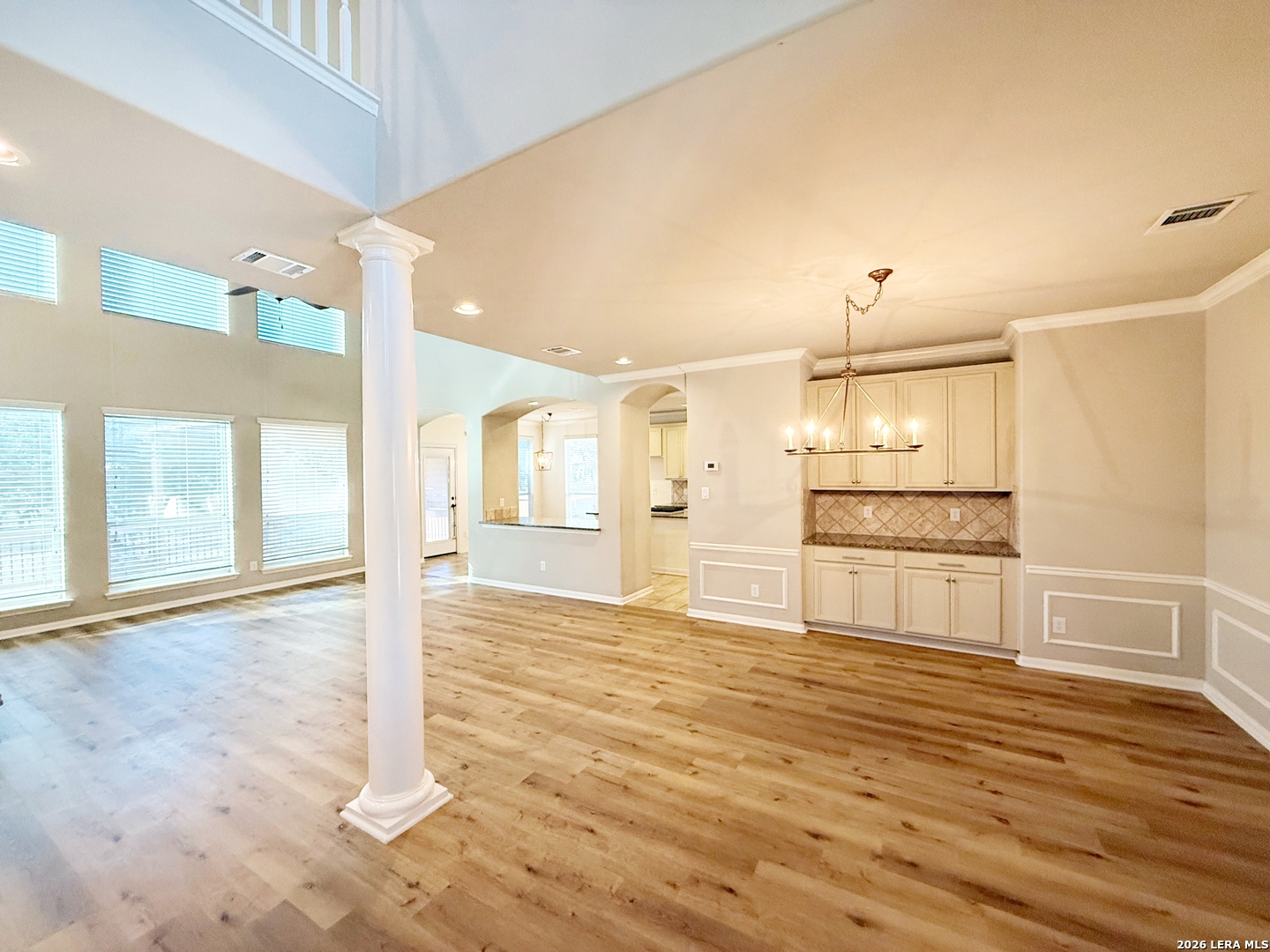 16015 Ponderosa Pth Helotes, TX 78023 - Photo 5 of 49 a view of a kitchen with wooden floor and outdoor space