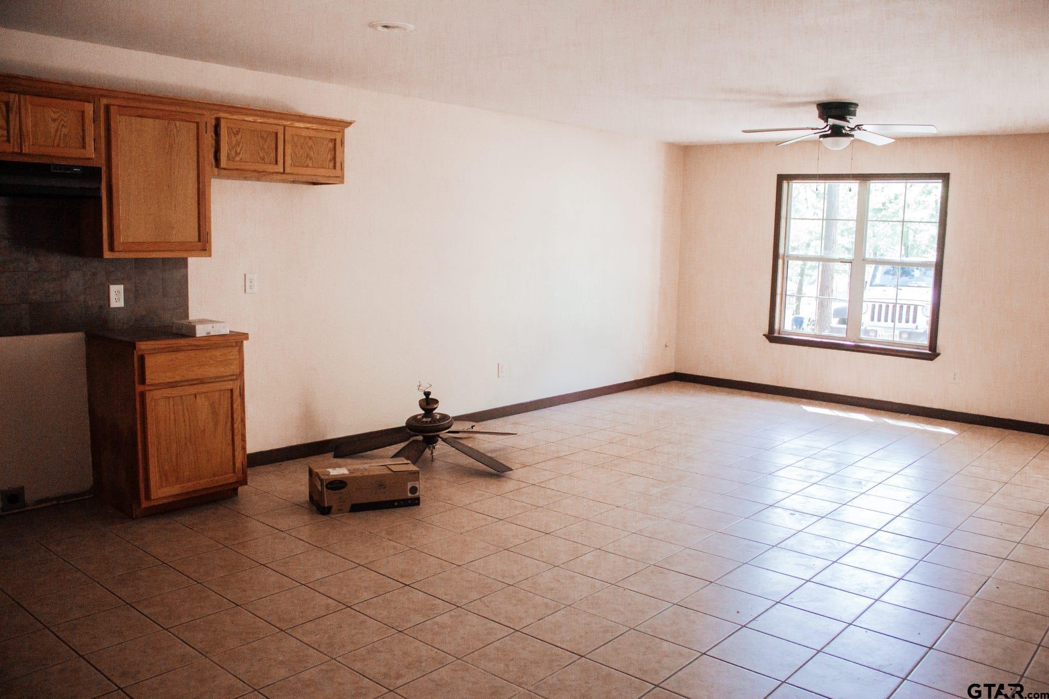 185 Caroline Street Rusk, TX 75785 - Photo 5 of 14 a view of a livingroom with furniture and window