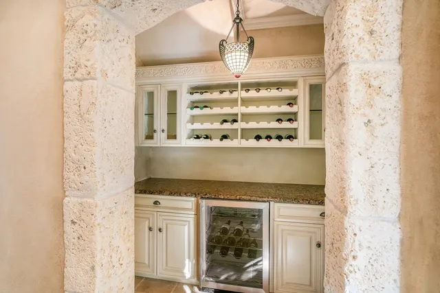 view of a bathroom with a sink and a mirror