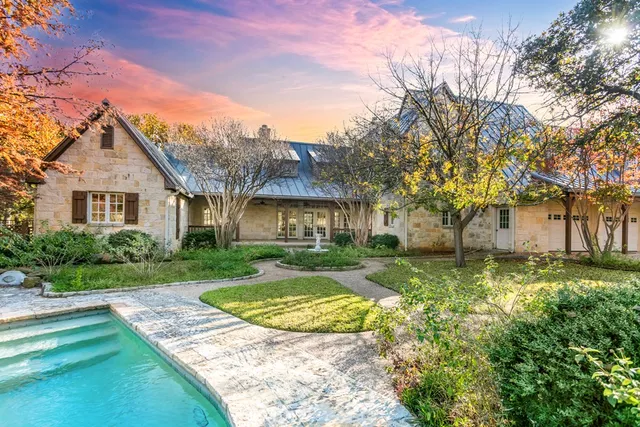 a bathroom with a shower and a mirror