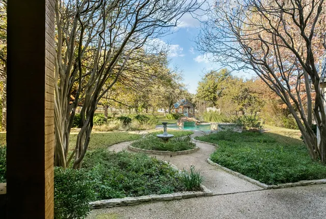 a view of backyard with green space