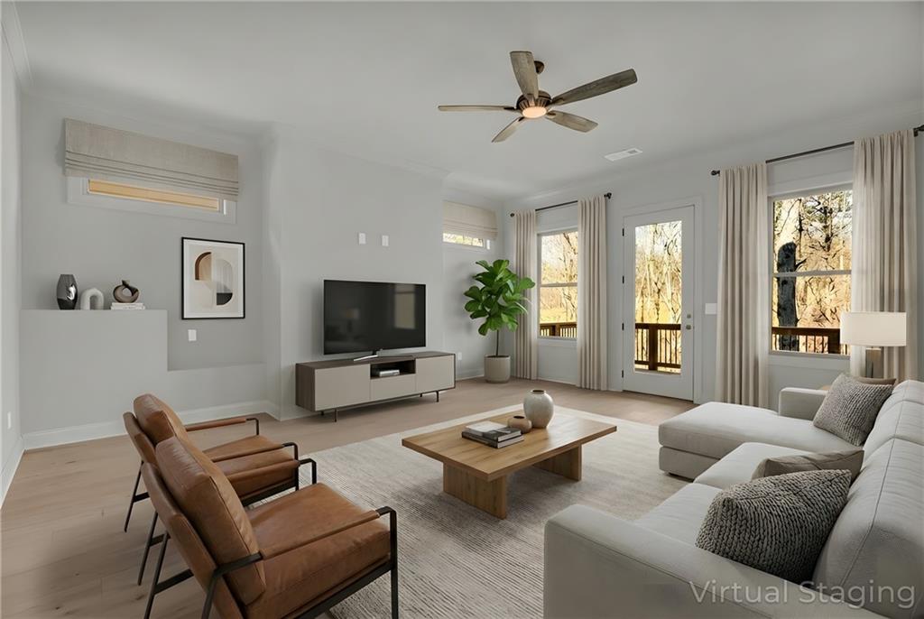 7054 Hammock Trail Gainesville, GA 30506 - Photo 42 of 72 a living room with furniture and a flat screen tv