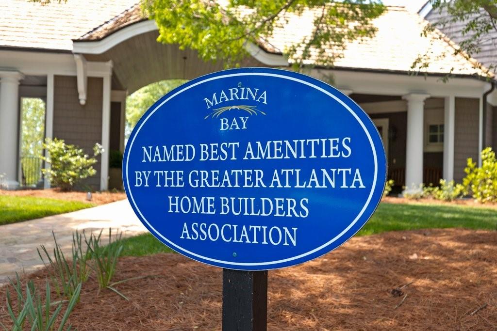 7054 Hammock Trail Gainesville, GA 30506 - Photo 60 of 72 a view of outdoor space with a garden and signage