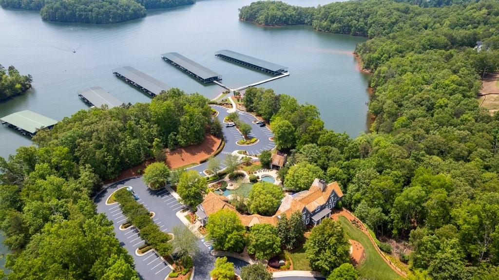 7054 Hammock Trail Gainesville, GA 30506 - Photo 69 of 72 an aerial view of a house with a yard and lake view