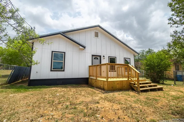 a house view with a garden space