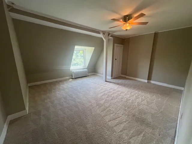 a view of backyard with green space