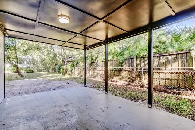 a view of a house with a tree