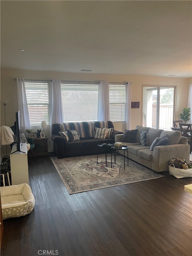 29192 Jacaranda Lake Elsinore, CA 92530 - Photo 6 of 7 a living room with furniture and a wooden floor