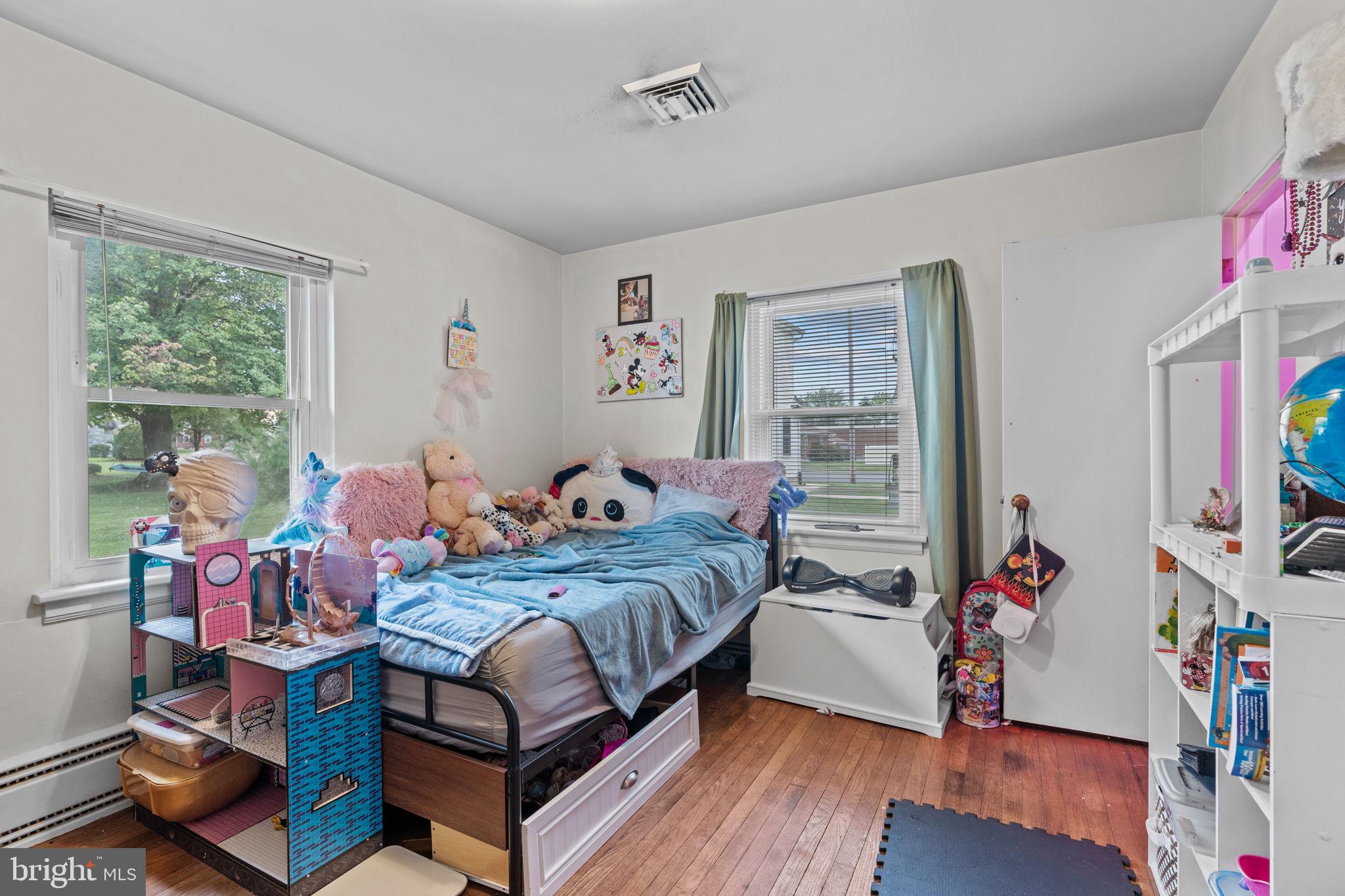 107-109 South Forge Road Palmyra, PA 17078 - Photo 13 of 22 a bed room with bed and a window