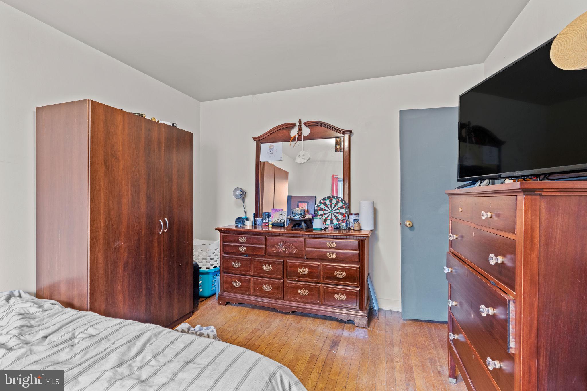 107-109 South Forge Road Palmyra, PA 17078 - Photo 17 of 22 a bedroom with a bed and a television