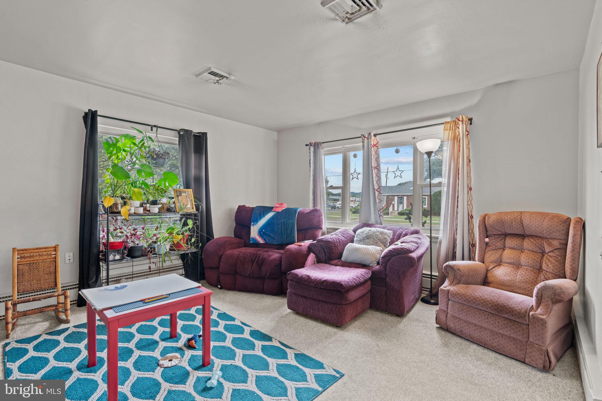 107-109 South Forge Road Palmyra, PA 17078 - Photo 18 of 22 a living room with furniture and a large window