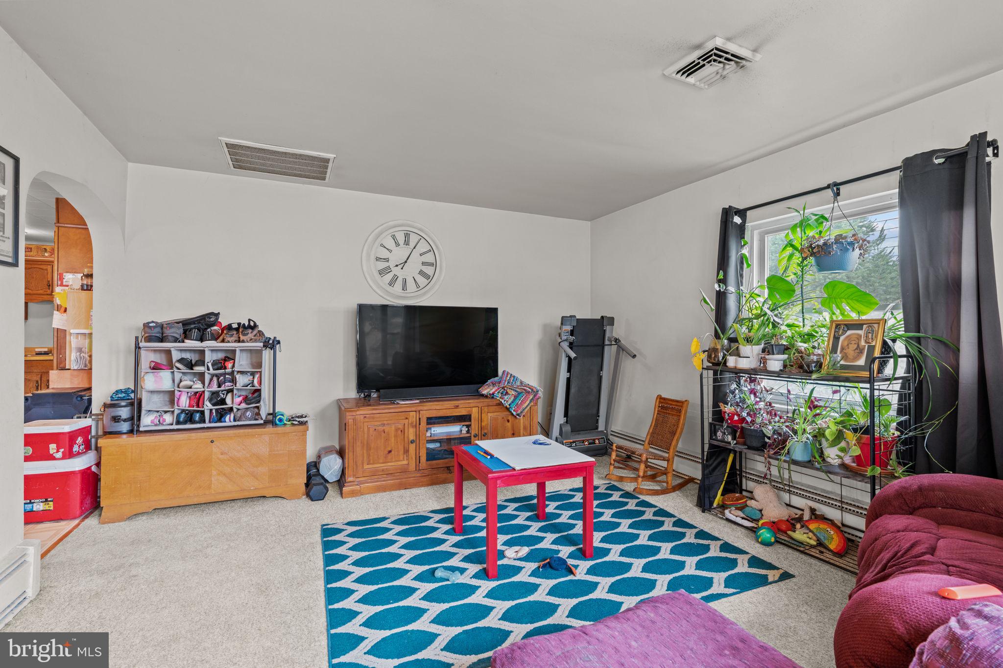 107-109 South Forge Road Palmyra, PA 17078 - Photo 19 of 22 a living room with furniture and a flat screen tv