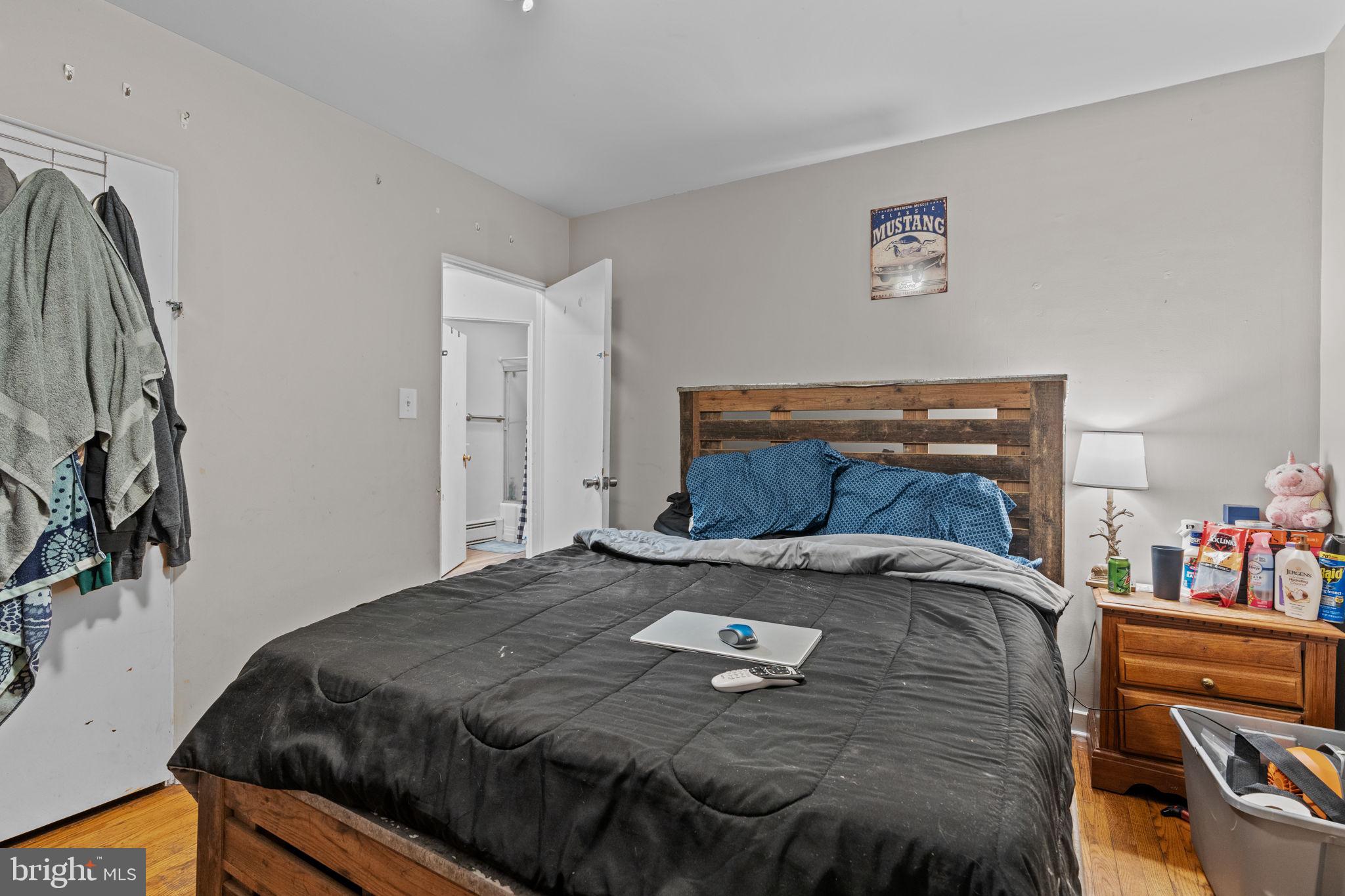 107-109 South Forge Road Palmyra, PA 17078 - Photo 9 of 22 a bed sitting in a bedroom next to a window