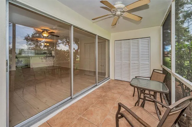 a view of a house with yard and tree s